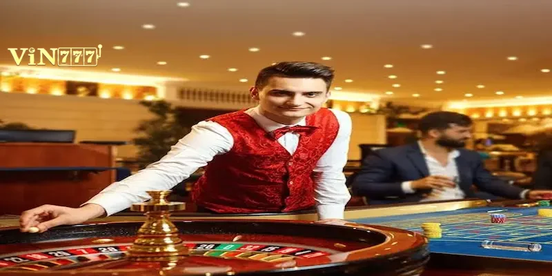 dealer-tuong-tac-truc-tiep-vin777 Bàn chơi Baccarat trực tuyến với góc quay chi tiết tại Vin777