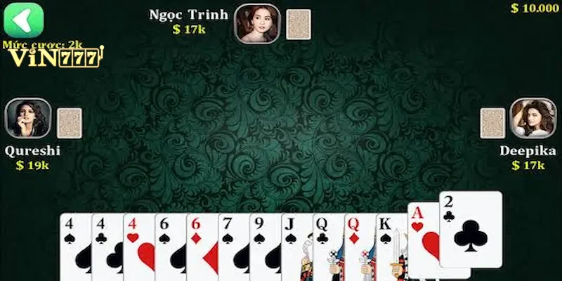 tien-len-chan-2-hieu-qua-vin777 Người chơi tập trung phân tích chiến thuật chặn bài trên màn hình